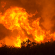 Flames from a wildfire burn Monday, Oct. 9, 2017, in Napa, Calif. The fire is one of several burning across Northern California. Photo: AP